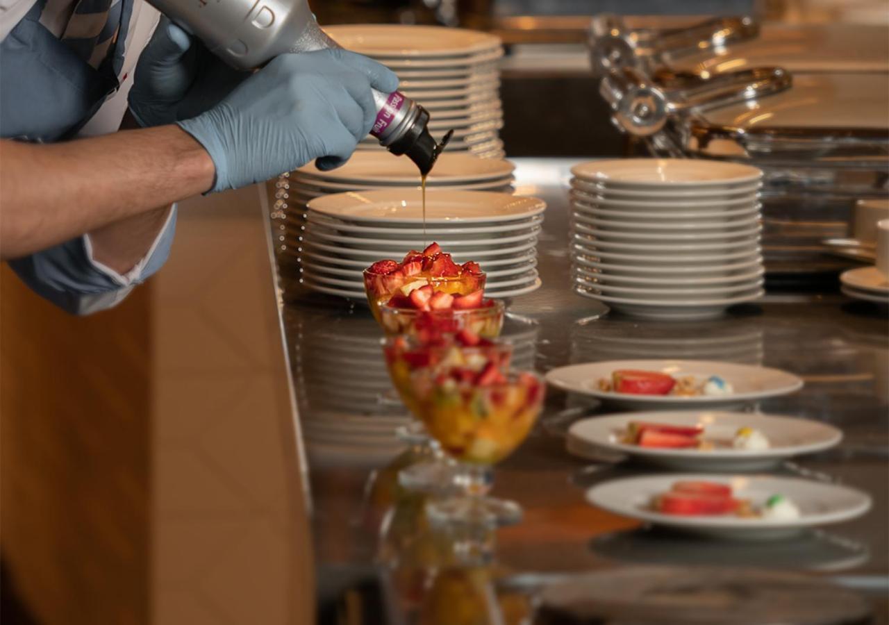 Crystal Inn Hotel - Alamein (Adults Only) El Alamein Eksteriør bilde A pastry chef finishing a dessert